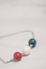 Load image into Gallery viewer, Red White &amp; Blue Beaded Bracelet
